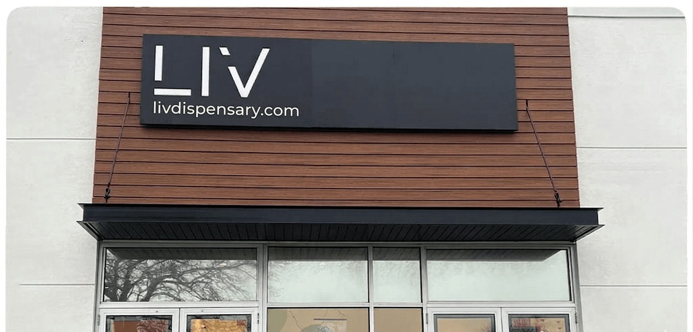 livdispensary comapany shop sign